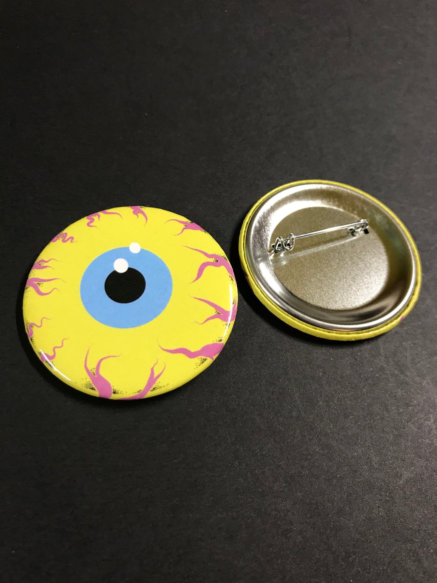 YELLOW EYE BUTTON