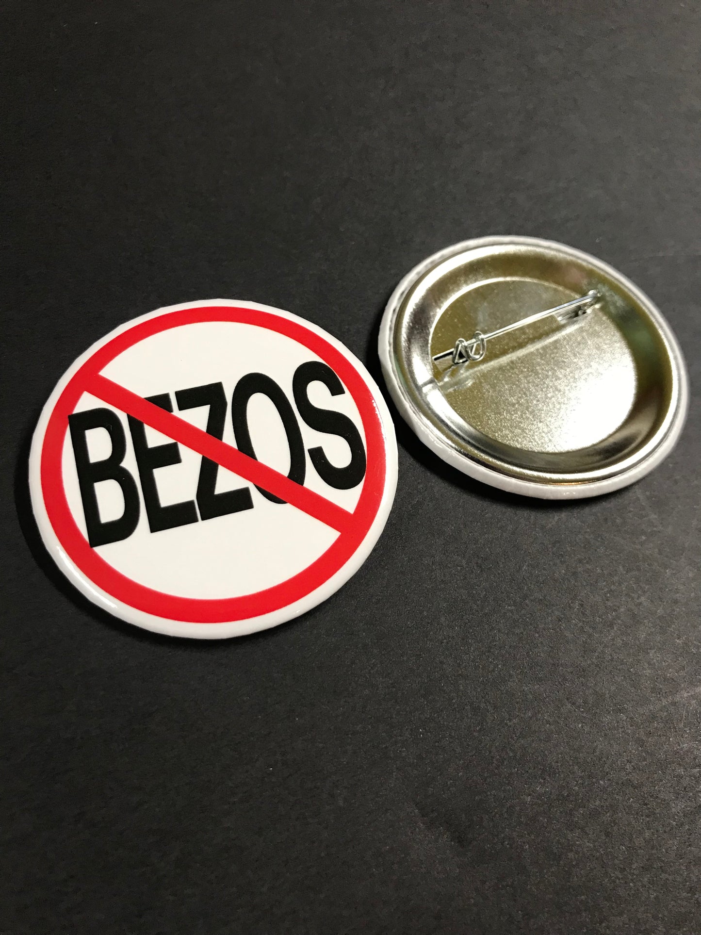 ANTI-BEZOS BUTTON