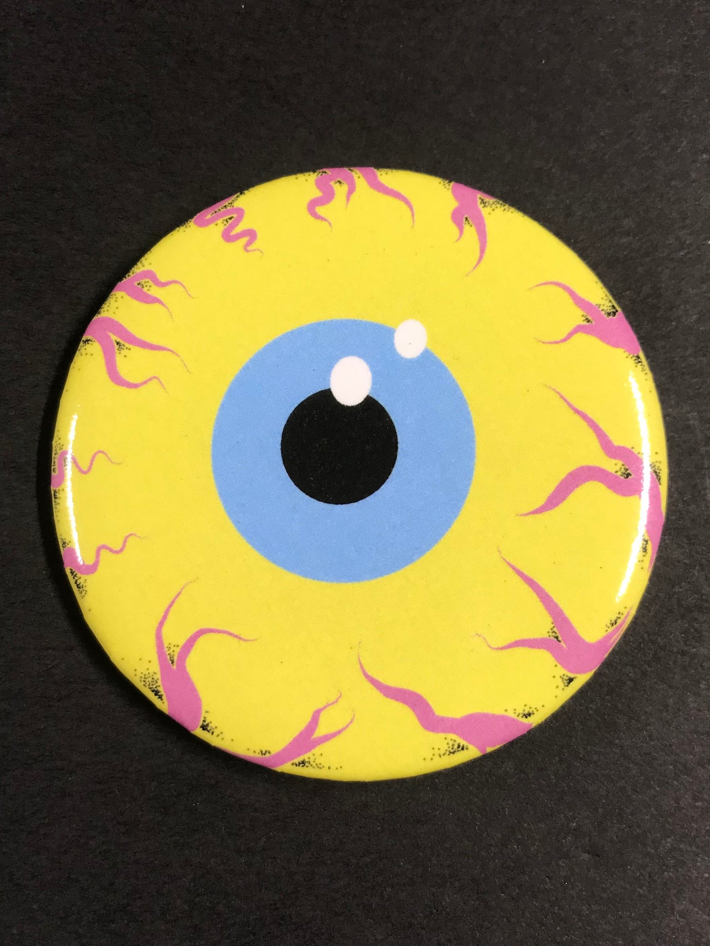 YELLOW EYE BUTTON