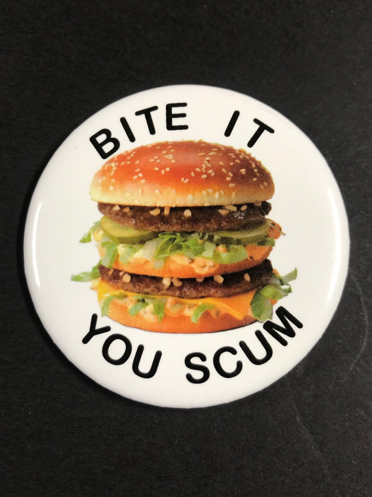 BITE IT SCUM BUTTON
